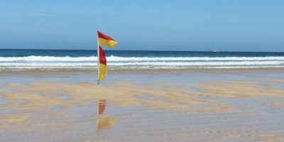 Beach flags in St Ives