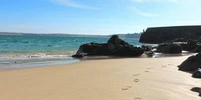 A beach in St Ives, Cornwall during the summer.