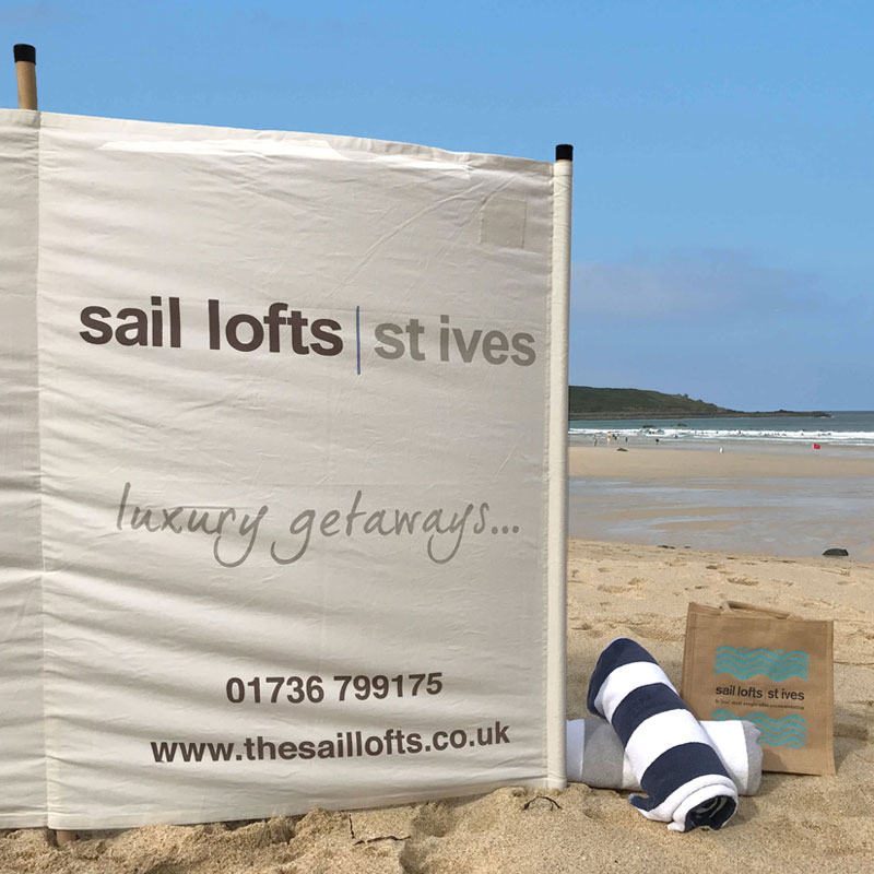 Wind break and beach towels on Porthmeor